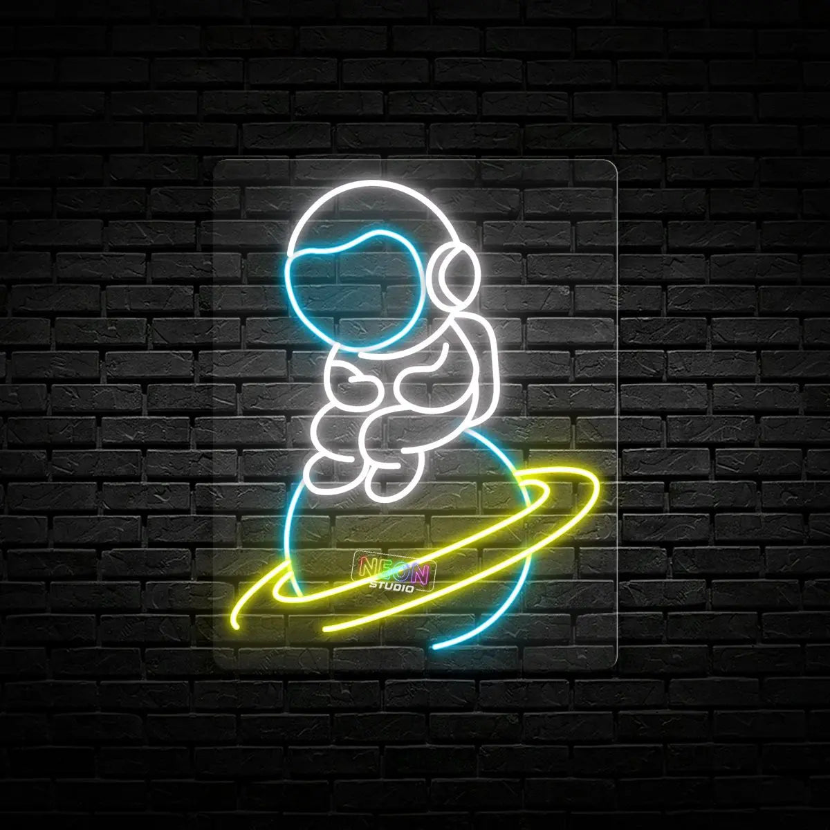 Astronaut Sitting on Planet neon sign